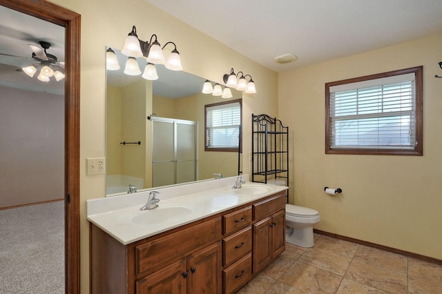 3684 Bridgewood Ave N, Springfield, MO 65803 - bathroom featuring a stall shower, a sink, and a healthy amount of sunlight