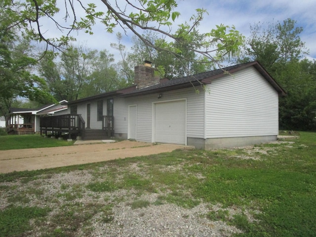 510 W 3rd St, Mountain View, MO 65548 - view of property exterior featuring driveway, a chimney, a garage, a wooden deck, and a yard
