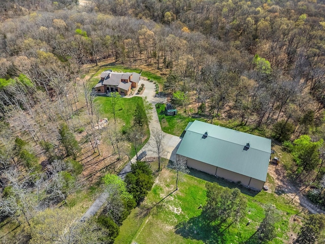 view from above of property with a forest