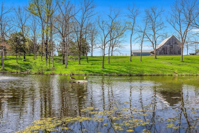 water view with a barn