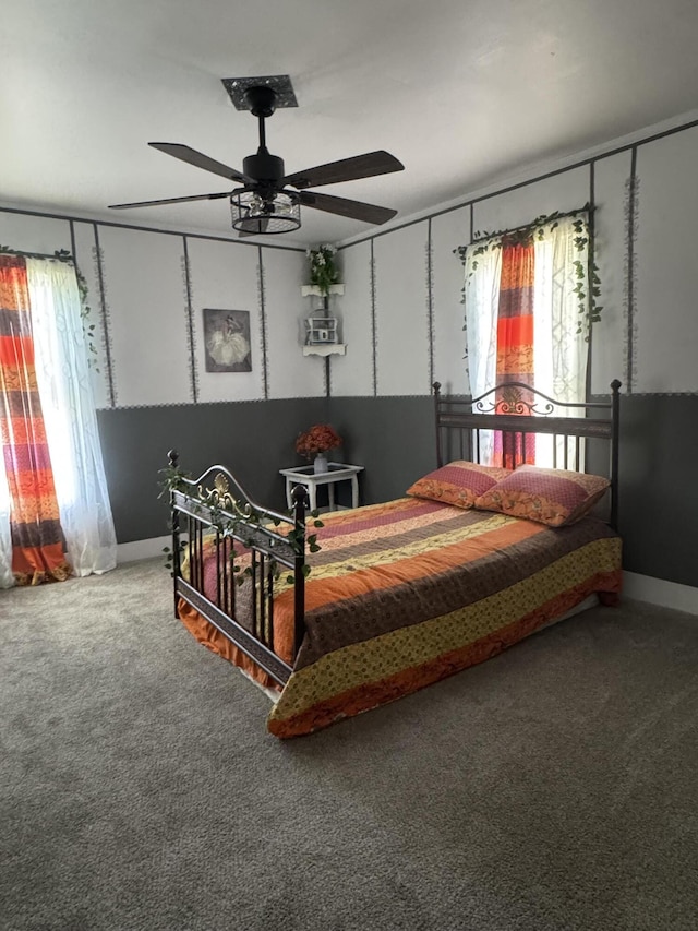 509 S Mansfield Rd, Ava, MO 65608 - carpeted bedroom featuring multiple windows, baseboards, and ceiling fan