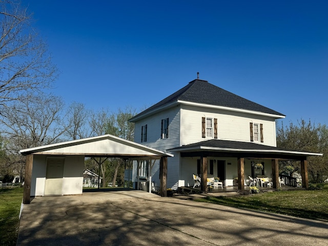 509 S Mansfield Rd, Ava, MO 65608 - view of front of property featuring a porch, roof with shingles, driveway, and a detached carport