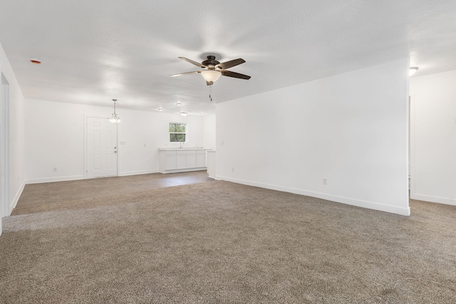 341 N Golden Ave, Springfield, MO 65802 - carpeted empty room with ceiling fan and baseboards