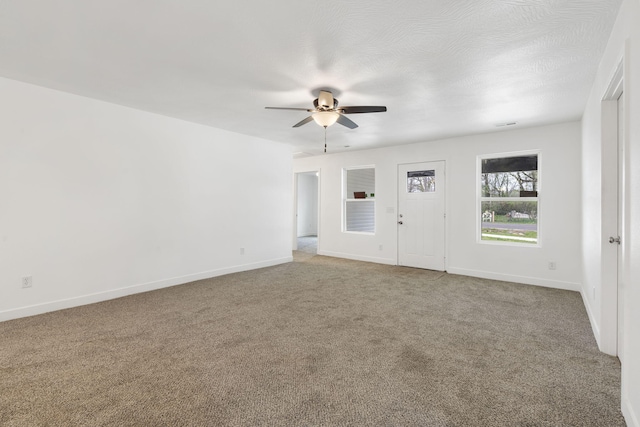 341 N Golden Ave, Springfield, MO 65802 - unfurnished room featuring ceiling fan, light carpet, and baseboards