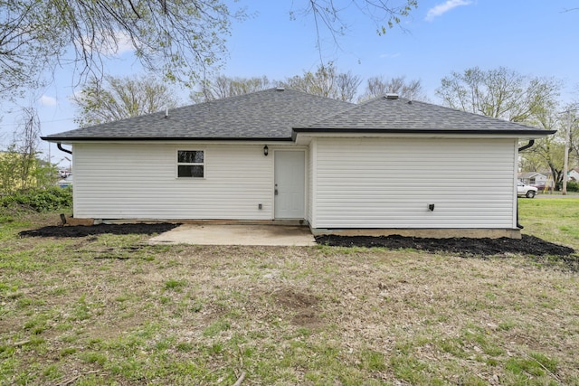 341 N Golden Ave, Springfield, MO 65802 - rear view of house with a patio area, a lawn, and roof with shingles
