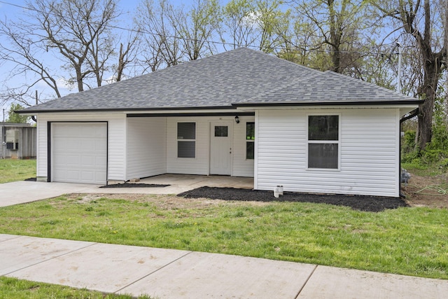 341 N Golden Ave, Springfield, MO 65802 - ranch-style home with a front yard, a shingled roof, and driveway