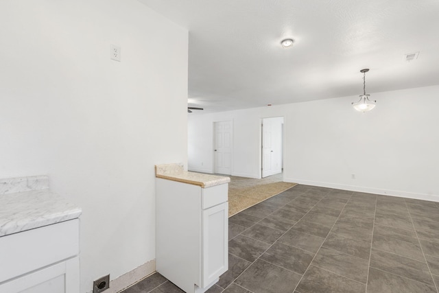 341 N Golden Ave, Springfield, MO 65802 - unfurnished room with visible vents and baseboards