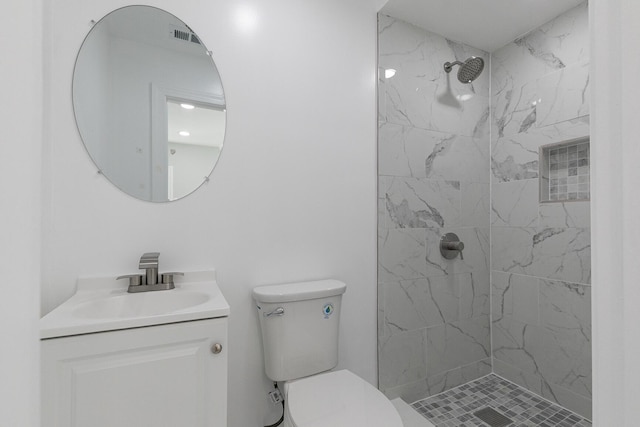 2120 N Broadway Ave, Springfield, MO 65803 - full bath featuring toilet, tiled shower, and vanity