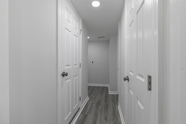 2120 N Broadway Ave, Springfield, MO 65803 - hallway with visible vents, baseboards, and dark wood-style floors