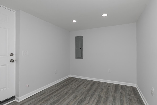 2120 N Broadway Ave, Springfield, MO 65803 - empty room with baseboards, recessed lighting, electric panel, and dark wood-style floors