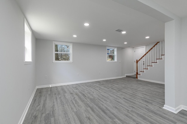 2120 N Broadway Ave, Springfield, MO 65803 - below grade area with visible vents, recessed lighting, wood finished floors, stairs, and baseboards