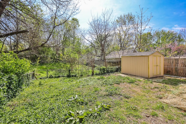 2120 N Broadway Ave, Springfield, MO 65803 - view of yard with an outbuilding, a shed, and a fenced backyard