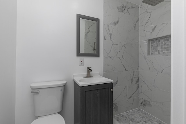 2120 N Broadway Ave, Springfield, MO 65803 - full bathroom featuring a marble finish shower, toilet, and vanity