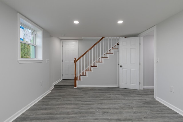 2120 N Broadway Ave, Springfield, MO 65803 - below grade area with baseboards, recessed lighting, wood finished floors, and stairs