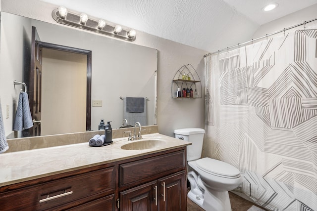 bathroom featuring a shower with shower curtain, vanity, vaulted ceiling, and toilet