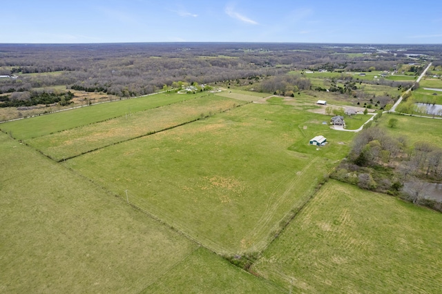 birds eye view of property featuring a rural view