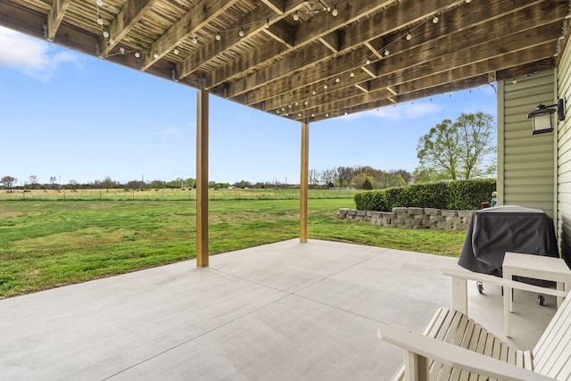 view of patio with a rural view
