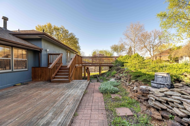 wooden deck featuring stairway