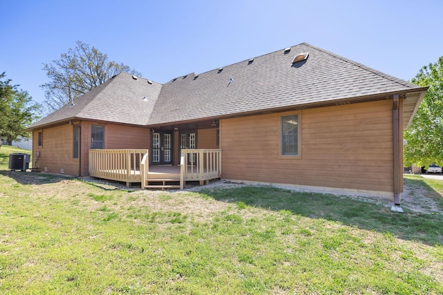170 Oakridge Ave, Branson, MO 65616 - back of property featuring central AC, a wooden deck, a yard, and roof with shingles