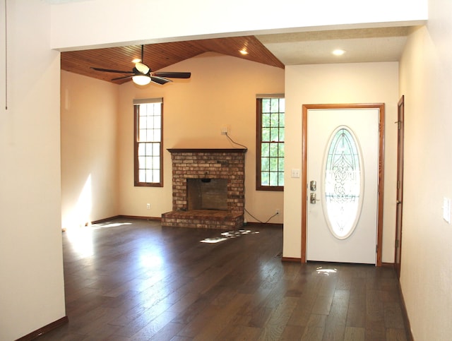 170 Oakridge Ave, Branson, MO 65616 - foyer entrance with a fireplace, dark wood-style floors, a ceiling fan, baseboards, and lofted ceiling