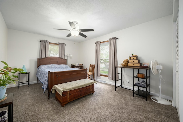 940 Industrial Dr, Neosho, MO 64850 - carpeted bedroom with baseboards and ceiling fan