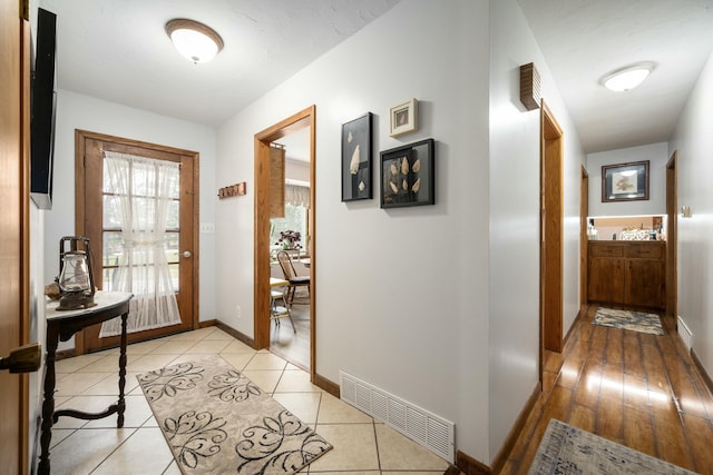 940 Industrial Dr, Neosho, MO 64850 - hall featuring baseboards and light tile patterned floors
