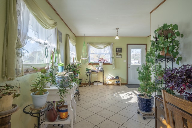 940 Industrial Dr, Neosho, MO 64850 - foyer with light tile patterned floors, baseboards, and crown molding