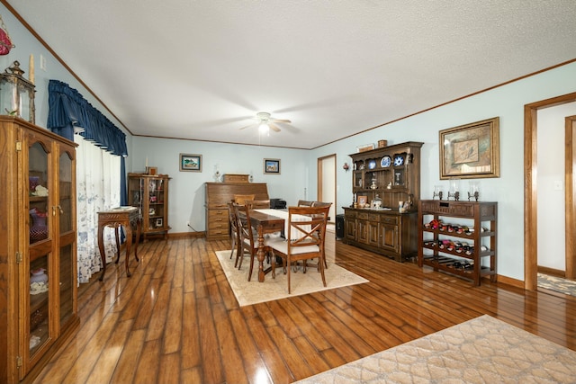940 Industrial Dr, Neosho, MO 64850 - dining area featuring ornamental molding, hardwood / wood-style flooring, a ceiling fan, and baseboards