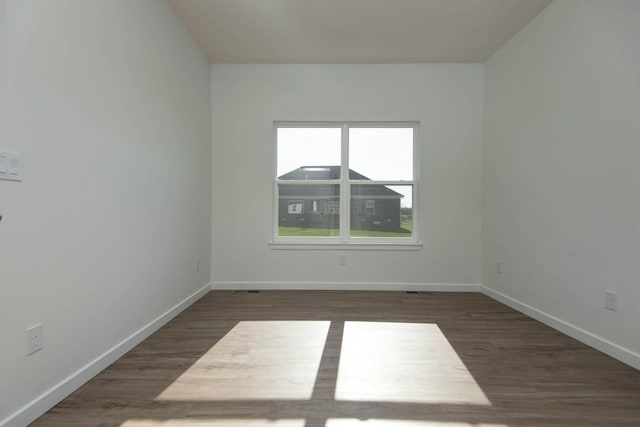 5896 Applewood Ave, Springfield, MO 65810 - spare room with baseboards and wood finished floors