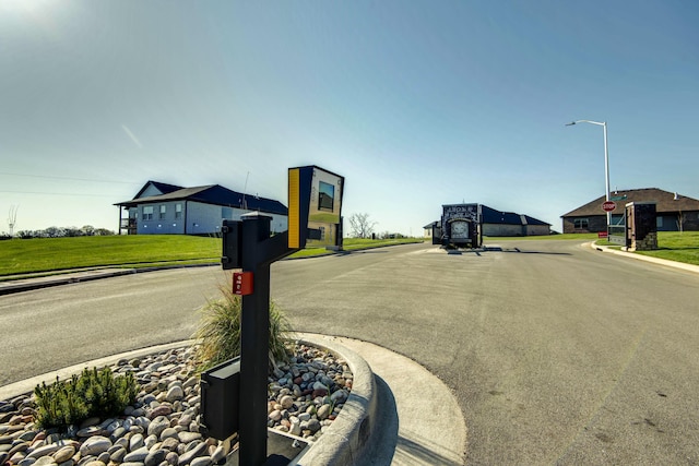 5896 Applewood Ave, Springfield, MO 65810 - view of road featuring street lights, curbs, sidewalks, and traffic signs