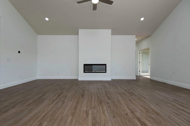 5896 Applewood Ave, Springfield, MO 65810 - unfurnished living room featuring a ceiling fan, wood finished floors, a glass covered fireplace, baseboards, and recessed lighting