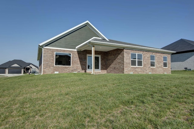 5896 Applewood Ave, Springfield, MO 65810 - view of front of house featuring crawl space, a front lawn, and brick siding
