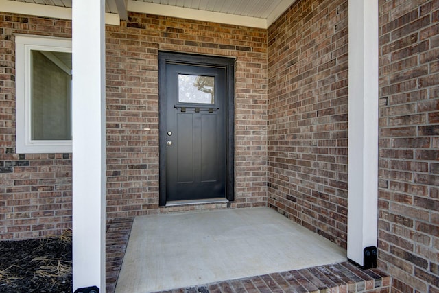 5896 Applewood Ave, Springfield, MO 65810 - property entrance featuring brick siding and covered porch