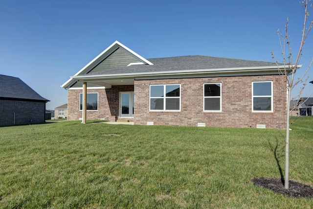 5896 Applewood Ave, Springfield, MO 65810 - back of property with brick siding, roof with shingles, crawl space, and a yard