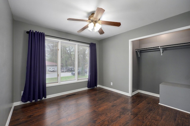 704 King St, Mount Vernon, MO 65712 - unfurnished bedroom with baseboards, wood finished floors, visible vents, and a closet