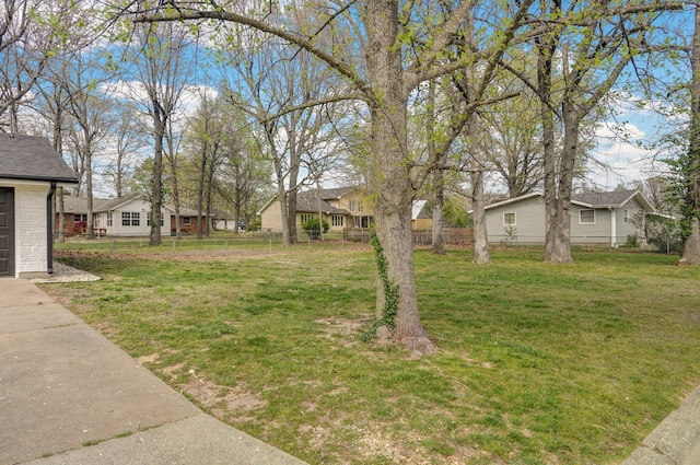 704 King St, Mount Vernon, MO 65712 - view of yard with a residential view and fence