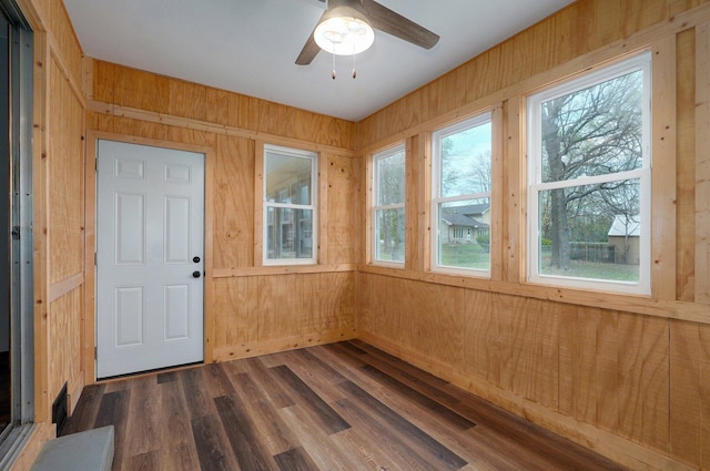 704 King St, Mount Vernon, MO 65712 - interior space featuring wooden walls, a wealth of natural light, and ceiling fan