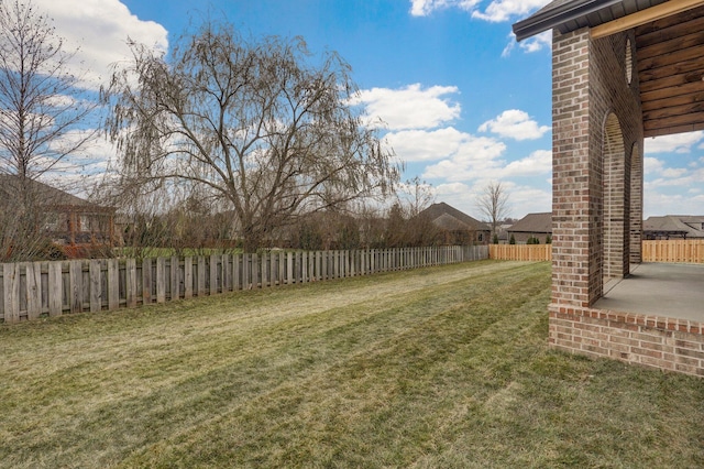 view of yard featuring a fenced backyard and a patio