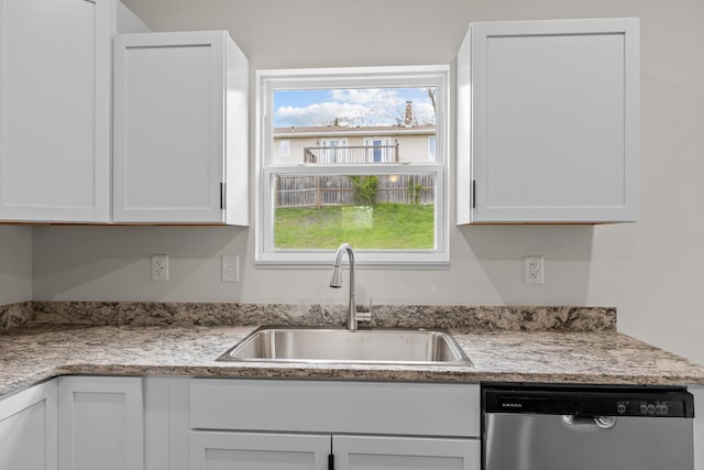 510 N Henry St, Mansfield, MO 65704 - kitchen featuring plenty of natural light, dishwasher, a sink, and white cabinetry