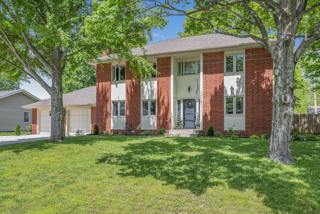 view of front of property featuring a garage, brick siding, and a front yard