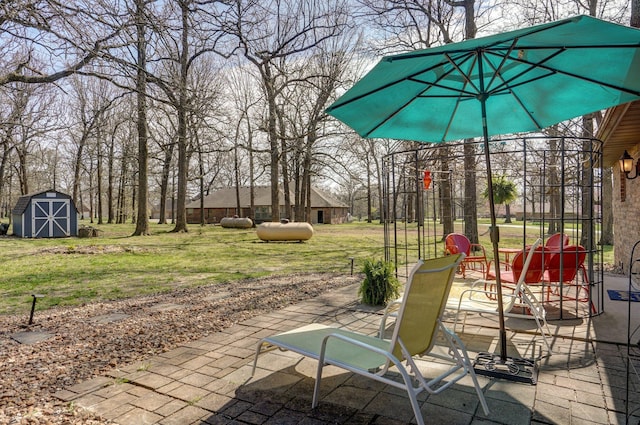 625 Parkwood Dr, Mount Vernon, MO 65712 - view of patio / terrace featuring an outbuilding and a storage shed