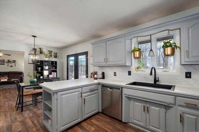 625 Parkwood Dr, Mount Vernon, MO 65712 - kitchen with a peninsula, light countertops, a sink, gray cabinets, and dishwasher