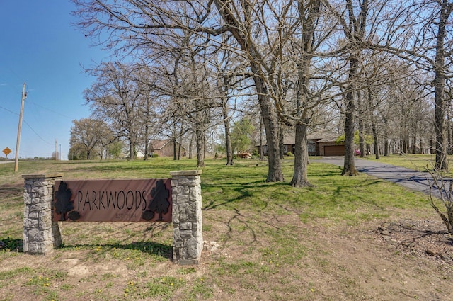 625 Parkwood Dr, Mount Vernon, MO 65712 - community sign featuring a garage, a yard, and aphalt driveway