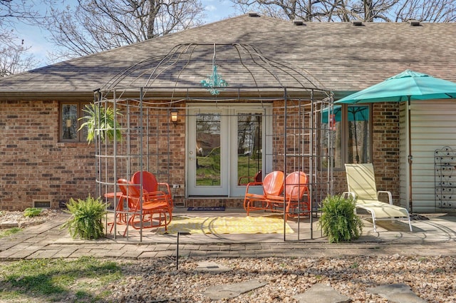 625 Parkwood Dr, Mount Vernon, MO 65712 - back of house with brick siding, roof with shingles, and a patio area