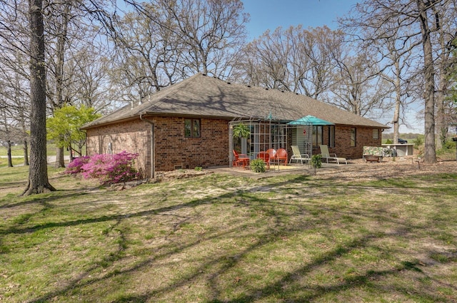 625 Parkwood Dr, Mount Vernon, MO 65712 - rear view of house with brick siding and a patio area