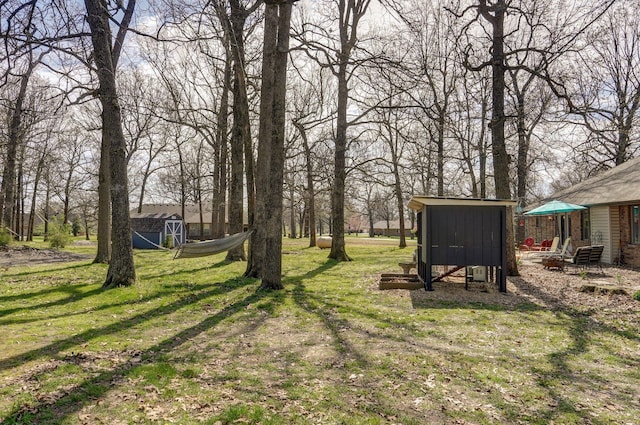 625 Parkwood Dr, Mount Vernon, MO 65712 - view of yard with an outbuilding, a shed, and exterior structure