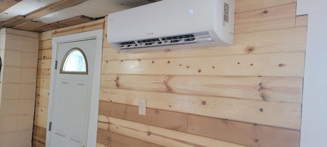 interior space featuring a wall mounted AC