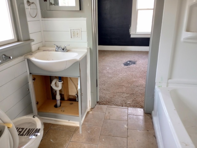 215 N Central Ave, Monett, MO 65708 - full bathroom featuring vanity and a bathtub
