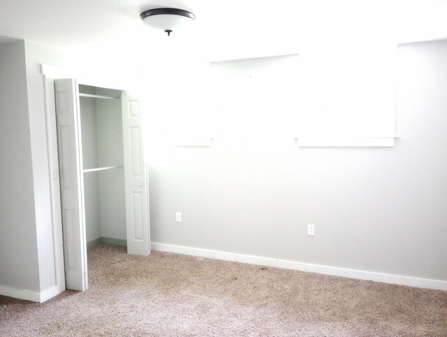 215 N Central Ave, Monett, MO 65708 - unfurnished bedroom featuring carpet flooring and baseboards