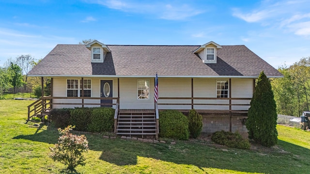 view of front of property featuring stairway, a porch, a shingled roof, and a front yard